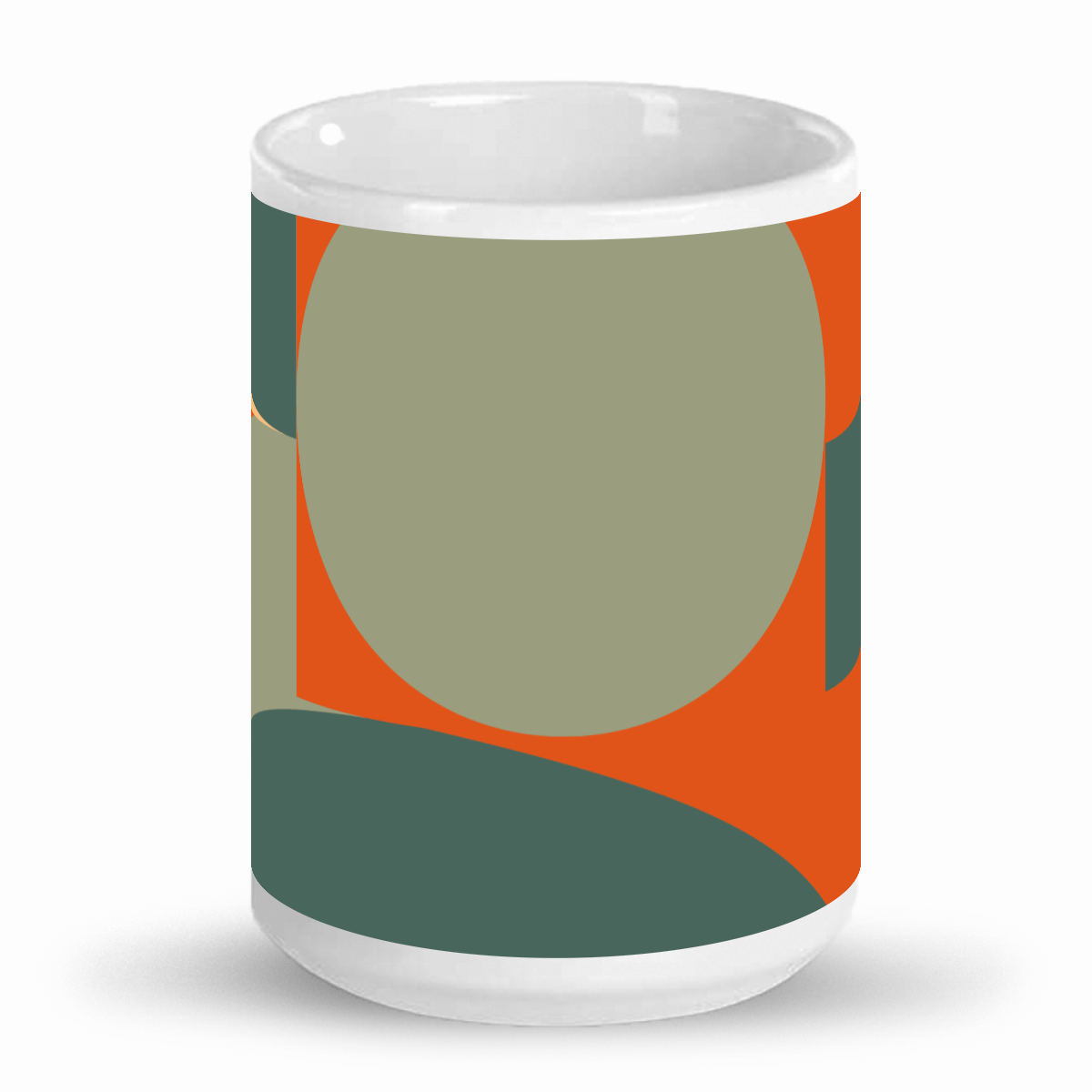 a coffee mug with an orange and green design on it